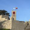 The Spanish and Galician flags flying above Castle Montereal