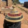 A mokorotlo is made of straw, and this hat says “Lesotho” on the side