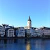 A big clock tower in Switzerland that shows the time