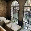 The ground floor of Fondazione Querini Stampalia, where water is able to flow into the perimeter of the room at high tide!