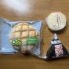 Breakfast - consisting of melon bread, and egg and salmon "onigiri", or rice balls