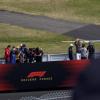 The racers going around the track. Racers include Lewis Hamilton, Charles Leclerc, and Max Verstapen