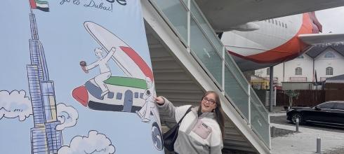 A poster for the Dubai chewy cookie (두바이 쫀득 쿠키) outside of the airplane cafe!