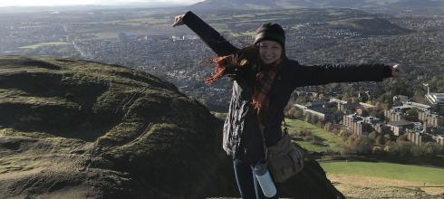 At the top of Arthur's Seat with Edinburgh below me