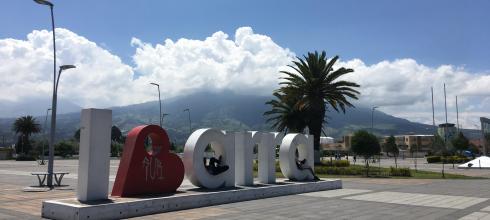 A big Ibarra sign in a public park called Parque Bolivar