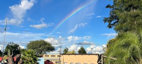 A rainbow came out after a rainy morning