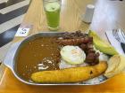 The world famous bandeja paisa and a spearmint lemonade drink