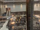 Looking through the glass-paneled elevator 