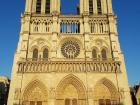 The front of the Notre-Dame Cathedral on a sunny, summer day