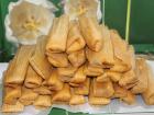 A pile of tamales wrapped in corn husks (Photo from PixaBay)