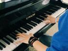 My friend playing piano