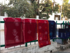 Despite how hot it is, scarves are also very popular here. Here are some homemade ones hanging up to dry