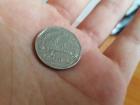 The five baht coin featuring Wat Benchamabophit