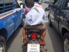 While Marley's mother drives a car, some parents drive their kids on their motorcycles