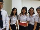 Nikki, middle, holding a birthday cake for my birthday