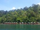 Villages float along the reservoir for tourists