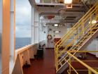 Walkway on the port side of the ship (beneath the lifeboats)