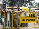 Rickshaw drivers in the classic tan collar shirts