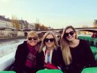 My mom, sister, and I on a boat on the Seine
