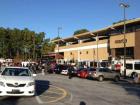 Many of the train stations have lots for people to park their cars. This station is at the end of the line going west 