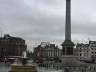 Buses navigating their way around Trafalgar Square