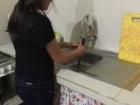 Micaela washing dishes after dinner