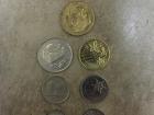 The backs of Malaysian sens (cents)