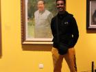 At the China Art Museum with a portrait of the late Mao Zedong 