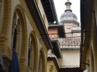 View from a small street of the largest Cathedral in Granada