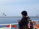 Riding a ferry en route to Jeju Island