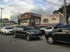 A shopping center in the town with mostly small stores, cafes and Korean restaurants