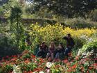 Some of my friends from class took a short rest on this bench amid the flowers