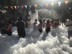 Day of the student celebration. Students playing in the bubbles. 