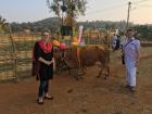 We stopped for a photo with this cow (and the calf behind her) on our way back from getting sugarcane as a snack in Yelagiri