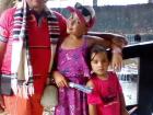 With Liseth and father Jaime; Jaime is wearing a traditional Colombian men's scarf and hat