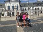 My foreign exchange student sisters and I in front of Bratislava's Presidential Palace 3 years ago