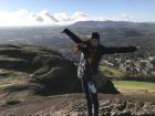 At the top of Arthur's Seat with Edinburgh below me