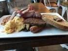 Toast, Tomato, Bacon, Sausage, Potato Scone, Mushrooms, Baked Beans, Black Pudding (Blood Sausage), Egg and Haggis
