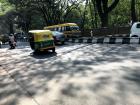 Buses and motorcycles are common ways to travel the city too