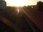 In the sunset, the train tracks look almost like a river