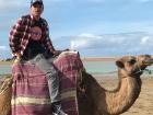 I rode a camel on the African coast in Asilah, Morocco