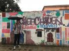 A mural in Chefchaouen, with the city name in the 3 main languages spoken there- French, Spanish and Arabic, 