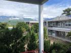 This is a view of one of the schools I teach at from the second floor. The "hallways" of the school are actually outside, and you can always see the mountains in the distance.