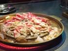 At this eatery in a mall, they cook the food right in front of you