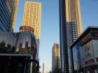 High rises are on the rise and with them come commercial districts - to the left is the top of a plaza I frequent 