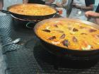 Learning how to make paella in cooking class 