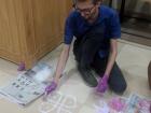 Making rangoli requires concentration. It is harder than it looks!