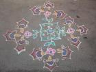 I found this rangoli on the sidewalk, where people normally make it