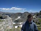 Reaching the summit after a long mountain climb in Colorado