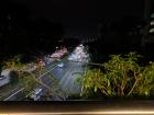 A highway of cars in the city at night